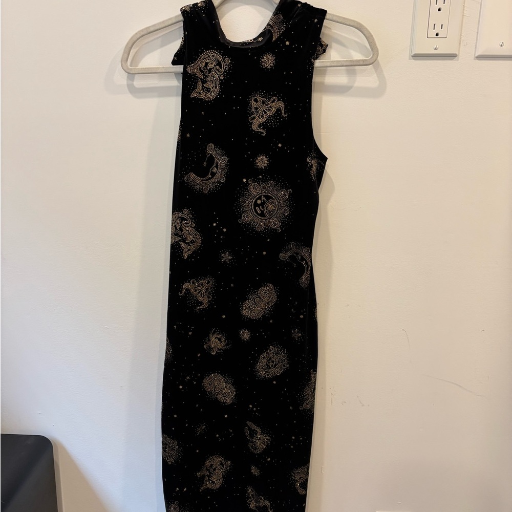 Black Sleeveless Dress with Gold Patterns